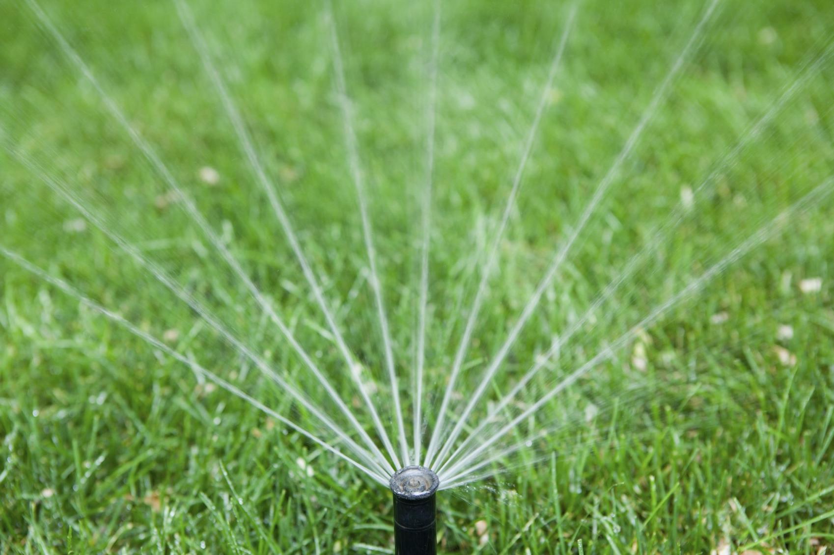 Sprinkler-efficient-reduced spray on lawn